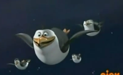 Ah yes... the magic of animation! :D

Its only to give the character's action's some emphasis, and to make it look as if they are amazing spy penguins that are superiously strong and can jump off 20 foot buildings. (and of COURSE they can! XD)
They do the same animation thing with Kowalski's abacus or clipboard; he pulls it out from behind his back somewhere, but nobody knows how.