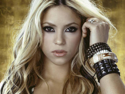  she is SURE Shakira..duuuh..love her music..it makes u dance:)