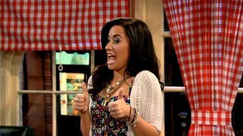  Screencaped picture from Sonny With A Chance :D To me it says "You're awesome, thumbs up!"