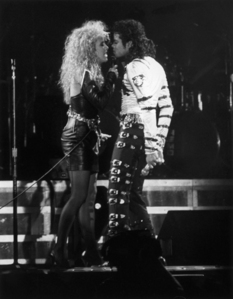  If they had as much chemistry as MJ's duet partner for the Dangerous Tour, then I would say he probably [i]did[/i] get...ahem...turned on (?) da her. The Dangerous Tour duet was pretty steamy, with all the...touching and stuff! *Envious sigh*