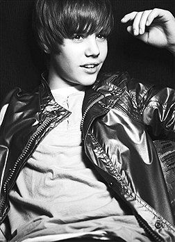 for me justin bieber is cute because of his hair style and his smile.....and also nis fashion dress...