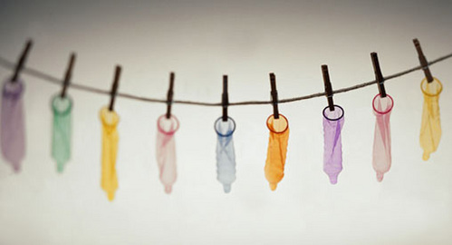  A condom is a thin rubber sheath worn on a man's penis during sexual intercourse as a contraceptive and/or as protection against infection. It physically blocks ejaculated semen from entering the body of a sexual partner (info from Google what is). There is also a female version of the condom. It is inserted into the viginal cavity.