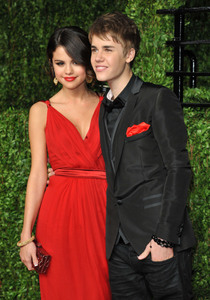 I am a real Justin and Selena fun I have poster of the both of them in my room!