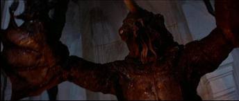 a bloke movie, Conan the Destroyer a great adventure movie but at the end conan rips out a horn from a monster head (dagoth) the sound of it getting slowy torn out with blood everywhere was scary for me as a kid but