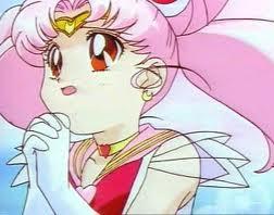 This is Usagi, known better as Chibiusa,the daughter of Usagi(the older one) from the future. She's also Sailor Chibi Moon.She has the same powers as Sailor Moon, moon and love powers, just less powerful.