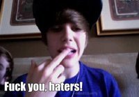  Justin Bieber is NOT gay!He goes out with Selena Gomez so how is that making him gay???DUMBO!