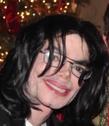  I cinta pictures of Michael when he's smiling! His whole face seems to light up!