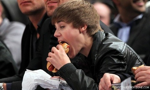 Eating a hotdog. what do u think about "THE HUNGRY BOY"?
