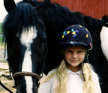  hope it counts! :) heres Young Taylor with a Horse! :]