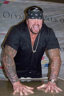 Undertaker ....
Look at his face It's very scary
Hhhhhh :O