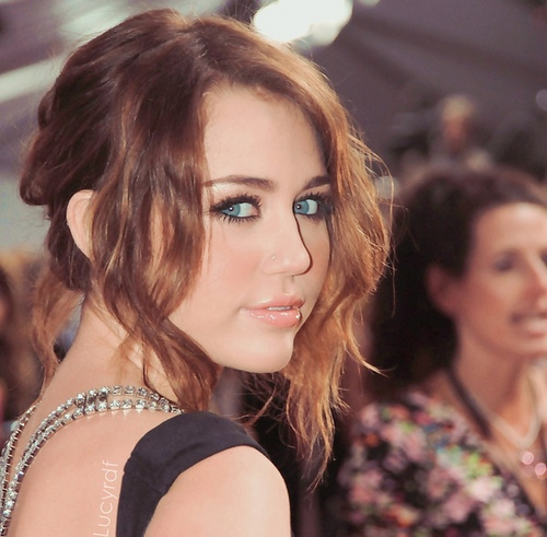 There is too many pictures where Miley is cute. I picked this because I think she looks cool and a little bit rockish.