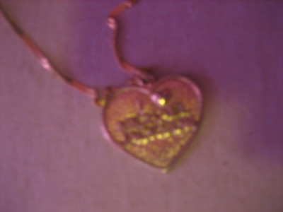  I have a lot of تصاویر of him and his songs, but my پسندیدہ thing is, I have heart-shaped ہار that says I دل Michael Jackson on it I'll wear it everyday of my life :D L.O.V.E <sorry the picture's not really that good