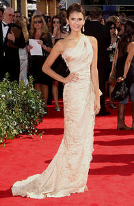 It is so hard to choose. I love all of Nina's dresses, but I will pick that one.
