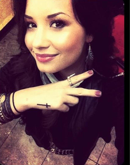 Demi Lovato: Tattoo with Cross and with the feather. Photos! - Demi Lovato  - Fanpop