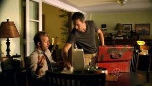  Steve McGarrett listens to a recording that was left in his father’s red toolbox before he was murdered.