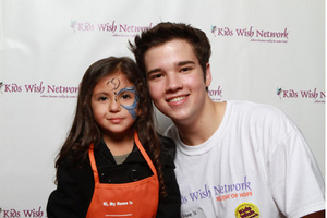  Nathan Kress on the "red carpet" with a little girl at White Memorial Medical Center.