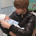  Justin with a cute baby!