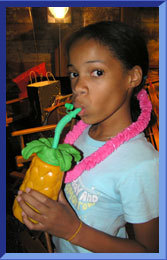  This is Taylor backstage, drinking and posing with her zalamero, batido de frutas drink.