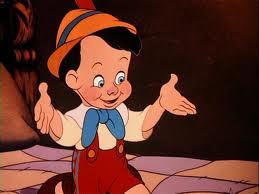 I guess maybe Pinocchio when he was a real boy. It may not be the best choice, but I'm just trying to