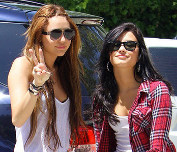  4 demi lovato with a friend with miley could find selena