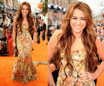 miley in yellow gown :) 