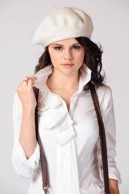 My selena in white. Vote for me!!!
http://www.5lyrics.com/lyrics/greg_kurka/selena_gomez.html
