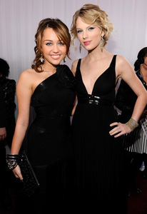 With Miley Cyrus. ;]

