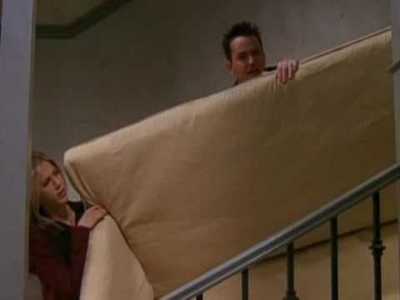 sorry could only find a picture with either Chandler and Rachel with the couch or just Ross with the 