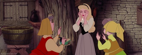 is this it?
If so then fine a screen cap of Snow White  singing into the well with the prince next to