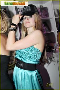  here am Avril in a black dress