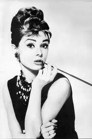  Not. She's cute, but not hot. Audrey Hepburn?