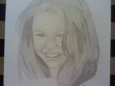 I just wanted to post this pic i drew of Miley I hope yall will check out my link. there's very few p