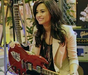 category 1-

demi with a guitar 1.