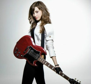 demi with a guitar 5.