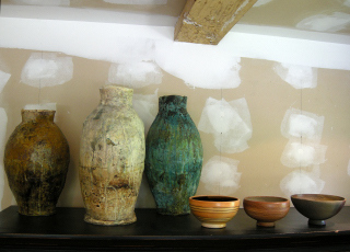 I took a quick pic for you..in my unpainted studio.  3 vase forms by my husband..he likes very organi