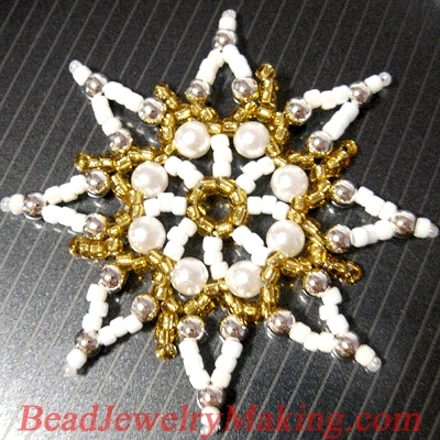  Just finished beading and drawing the tutorial for a Beaded Christmas ornament in the shape of a Snow