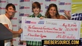 WNFN presents a check to Justin - justin-bieber photo