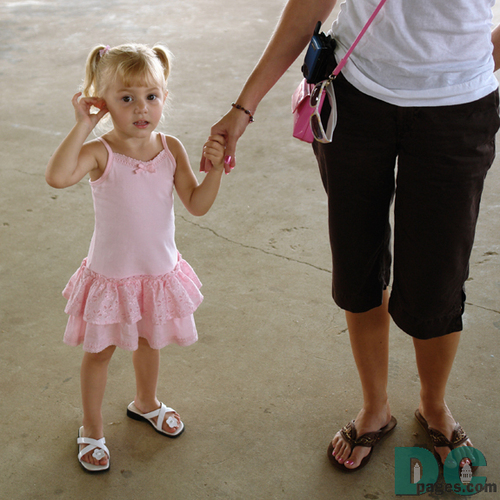  Rneesme going to her dance class holding Mommas hand