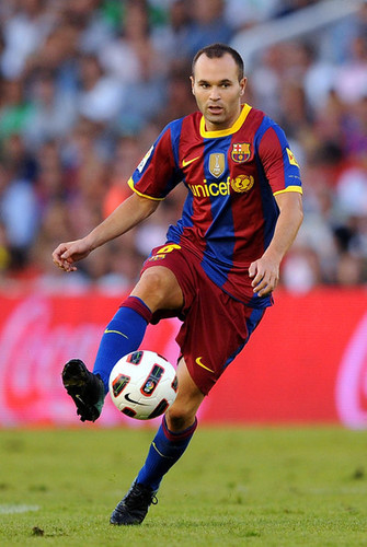 A. Iniesta playing for Barcelona