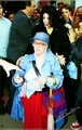He escorted the old lady to his waiting car and offered her a lift home. - michael-jackson photo