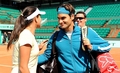 Roger Federer kisses Ana Ivanovic - tennis photo