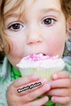 Renesmee teying a cupcake - renesmee-carlie-cullen photo