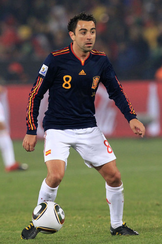 Xavi playing for Spain