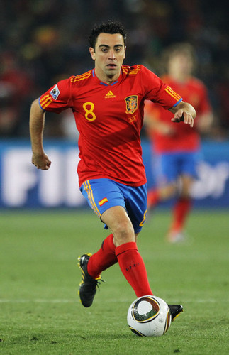 Xavi playing for Spain