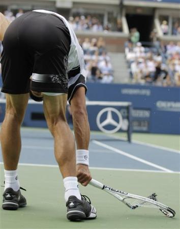 Новак Джокович Photo: djokovia жопа, попка and racquet.
