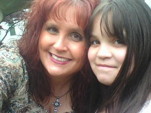 me and my mom 4 years ago i was 10 in this pic !!! :O