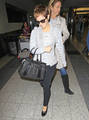 16.11.Emma arriving at the  Laguardia Airport - harry-potter photo