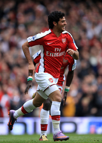  C. Vela playing for Arsenal