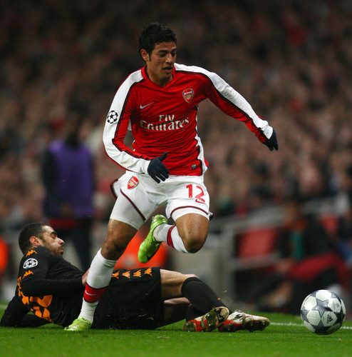 C. Vela playing for Arsenal