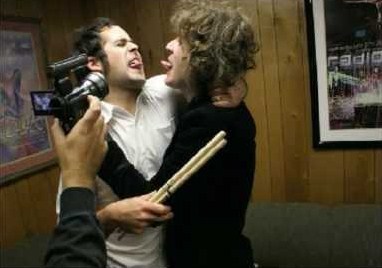  Ronnie and Dave doing a tongue-thingy